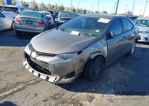 2019 Toyota Corolla Le z USA, uszkodzony, nr VIN 5YFBURHE0KP861771